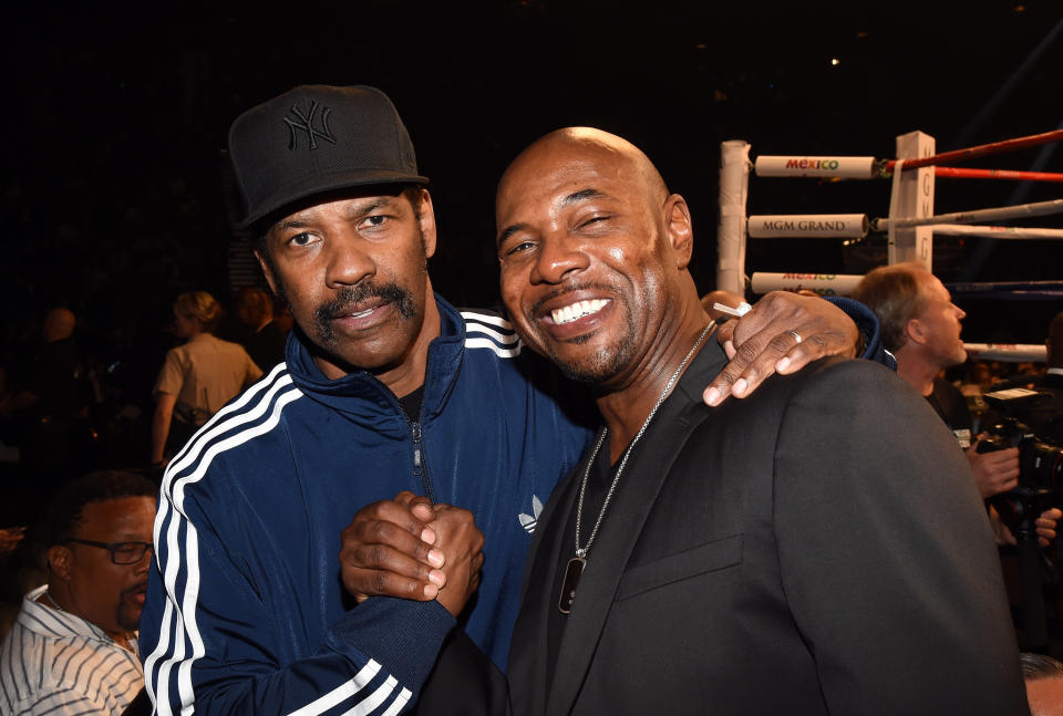 LAS VEGAS, NV – MAY 02: Actor Denzel Washington (L) and director Antoine Fuqua pose ringside at “Mayweather VS Pacquiao” presented by SHOWTIME PPV And HBO PPV at MGM Grand Garden Arena on May 2, 2015 in Las Vegas, Nevada. (Photo by Ethan Miller/Getty Images for SHOWTIME)