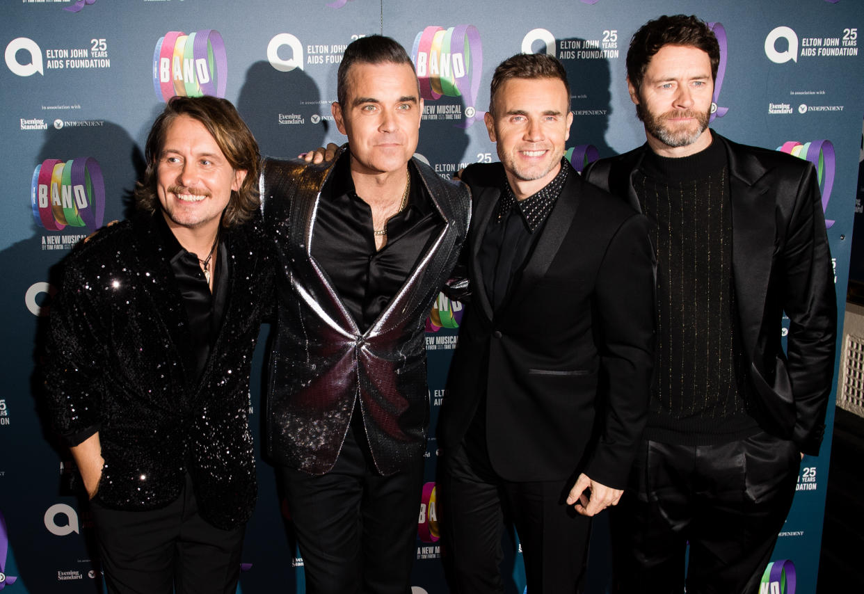 LONDON, ENGLAND - DECEMBER 04:  Mark Owen, Robbie Williams, Gary Barlow and Howard Donald attend a charity gala performance of "The Band" in aid of the Elton John AIDS Foundation at Theatre Royal Haymarket on December 04, 2018 in London, England. (Photo by Samir Hussein/WireImage)