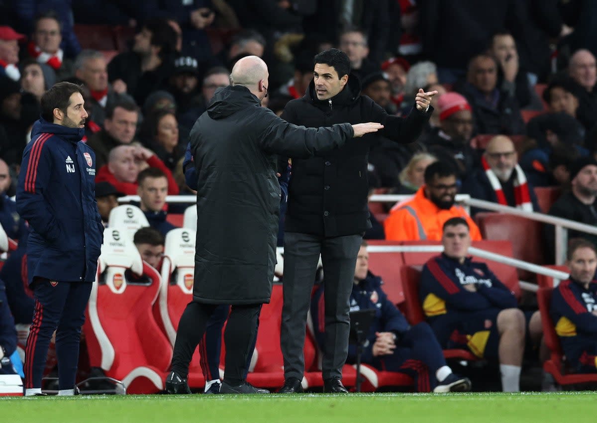 Arsenal coach Mikel Arteta (right) remonstrates with the fourth official (REUTERS)