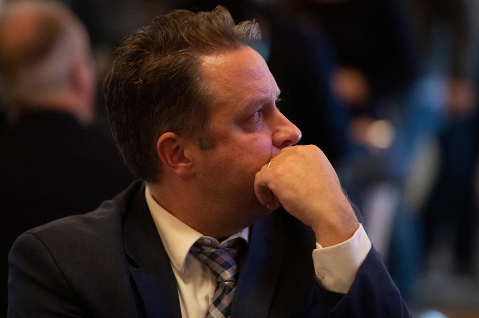 Democrat Prosecutor candidate Jon Schaefer watches as election results begin to show while attending an election watch party hosted by the Vanderburgh County Indiana Democratic Party Tuesday evening, Nov. 8, 2022.