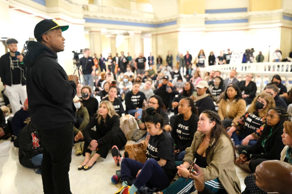 Supporters, including students from Classen SAS High School at Northeast who staged a walk out and marched to the Capitol, take part in a vigil Wednesday for Julius Jones.