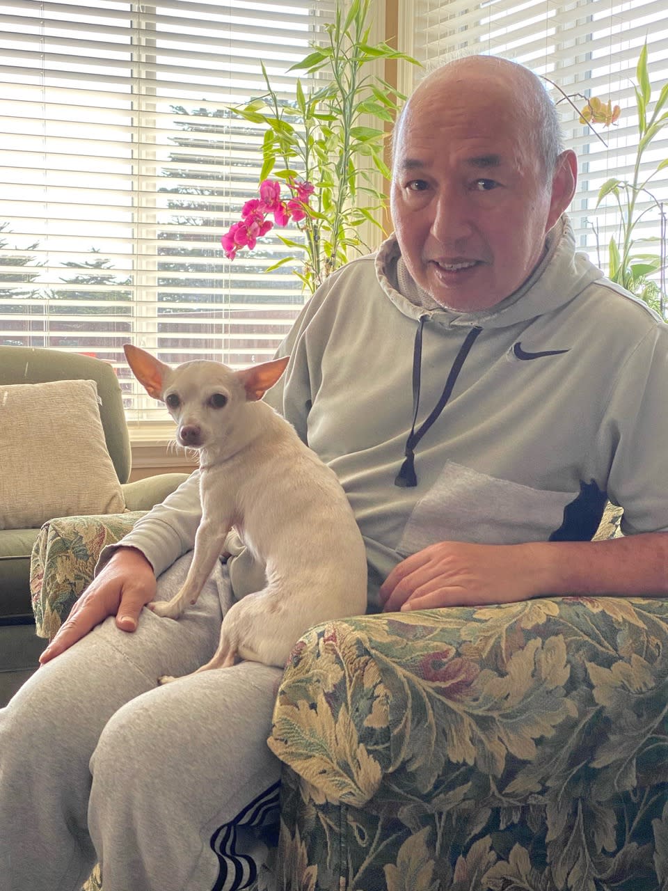 Johanna Carrington’s caregiver, Eddie Martinez, takes Gucci on daily walks and cooks chicken for him as a treat. Having a strong support system can help seniors successfully adopt pets. (Courtesy Debbie Carrington )