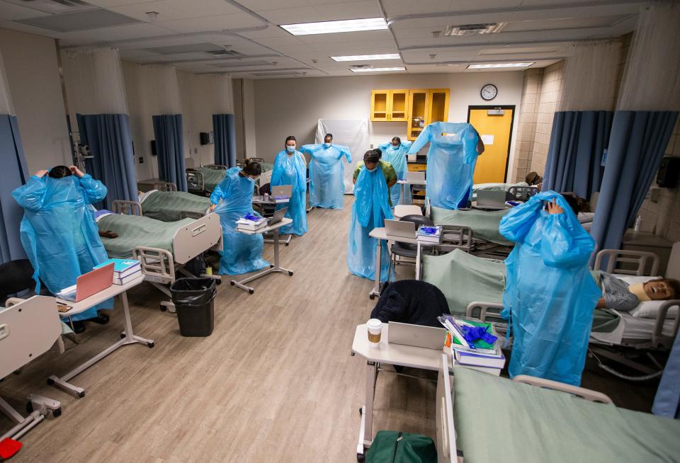 Students at the Ivy Tech Community College South Bend-Elkhart's Beacon Health System School of Nursing prepare for their first day of class on Wednesday, Jan. 19, 2022.