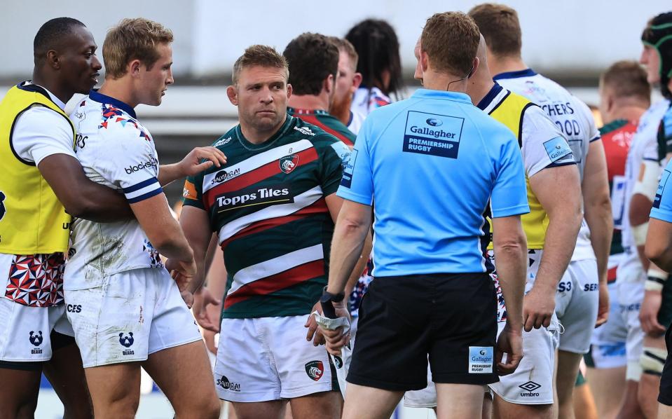 Tom Youngs (centre) confronts the officials after fractious Leicester-Bristol match - GETTY IMAGES