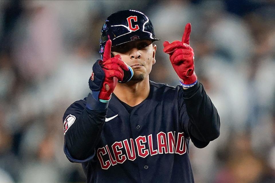 Cleveland Guardians Andres Gimenez reacts after hitting a double to right field against the New York Yankees during the second inning of Game 1of an American League Division baseball series, Tuesday, Oct. 11, 2022, in New York. (AP Photo/John Minchillo)