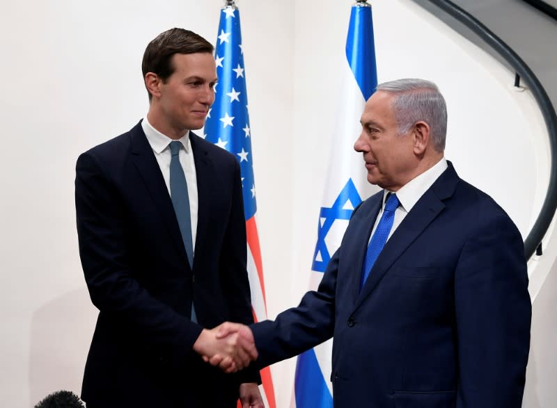 FILE PHOTO: Israeli Prime Minister Benjamin Netanyahu shakes hands with Senior White House advisor Jared Kushner during their meeting in Jerusalem