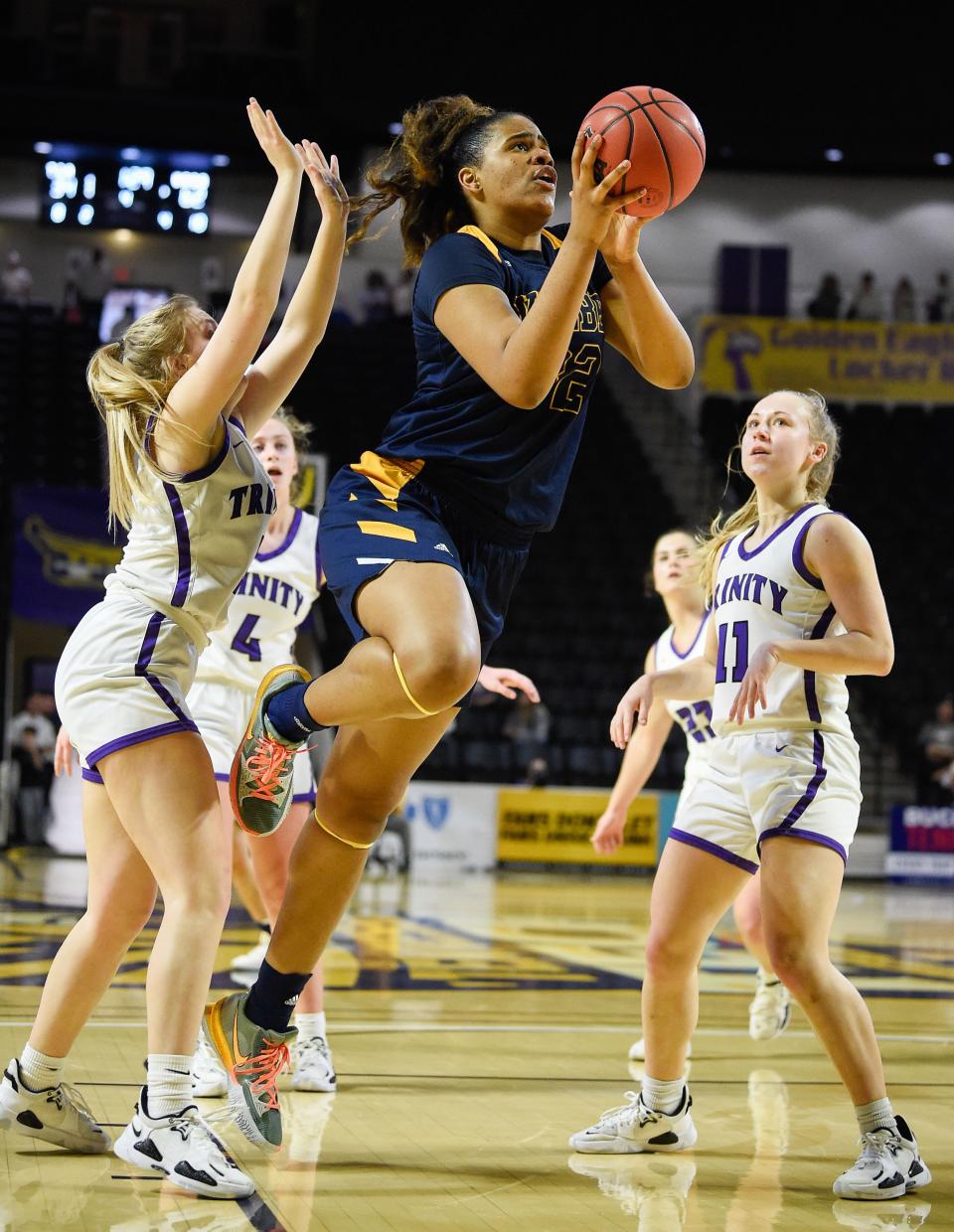 Webb's Aalyah Del Rosario (32) shoots the ball against Trinity Christian during the Division II Class A State Girls' Basketball Tournament in March.