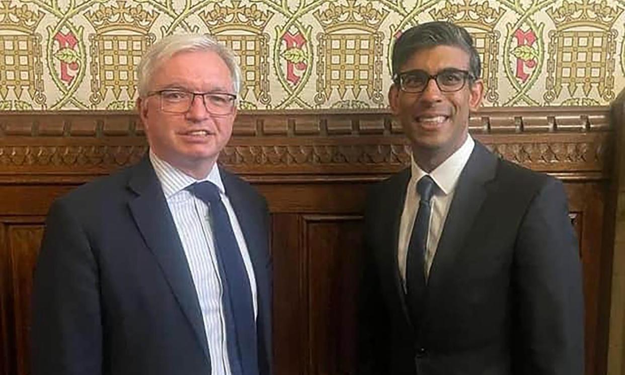 <span>MP Mark Menzies, left, with Rishi Sunak, was suspended last week over an alleged late-night phone call to a former aide demanding £5,000 to pay ‘bad people’ holding him in his flat.</span><span>Photograph: Mark Menzies / Facebook</span>