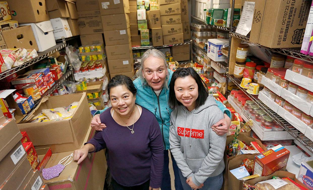 From left, Connie Ortiz, Melinda Alexander and Summer Lui work at the Quincy Community Action Programs food pantry in Brewers Corner on Monday, Dec. 13, 2021.