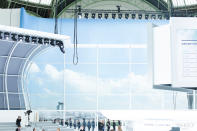 <p>Made to look like a Chanel airport, the set included an arrivals and departures sign as well as branded luggage carts and ticket takers. <br></p>