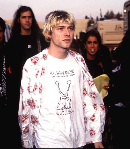 <p>Kurt Cobain at the 1992 MTV Video Music Awards. The show was memorable due to a backstage feud between Axl Rose and members of Nirvana, as well as Courtney Love, Cobain's wife.</p>