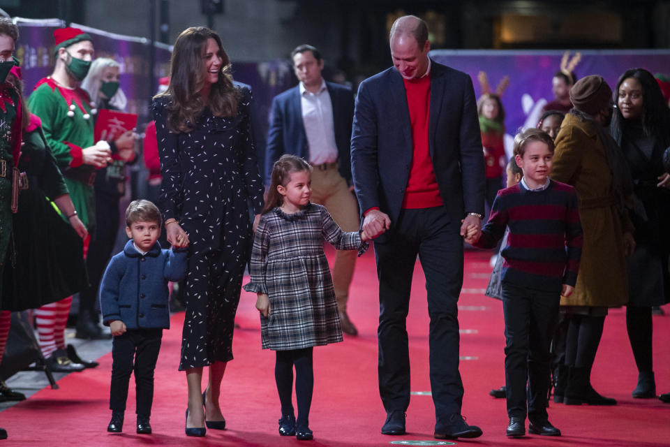 Prince William, Duke of Cambridge and Catherine, Duchess of Cambridge with their children, Prince Louis, Princess Charlotte and Prince George, attend a special pantomime performance at London's Palladium Theatre, hosted by The National Lottery, to thank key workers and their families for their efforts throughout the pandemic on December 11, 2020 in London, England. (Photo by  Aaron Chown - WPA Pool/Getty Images)