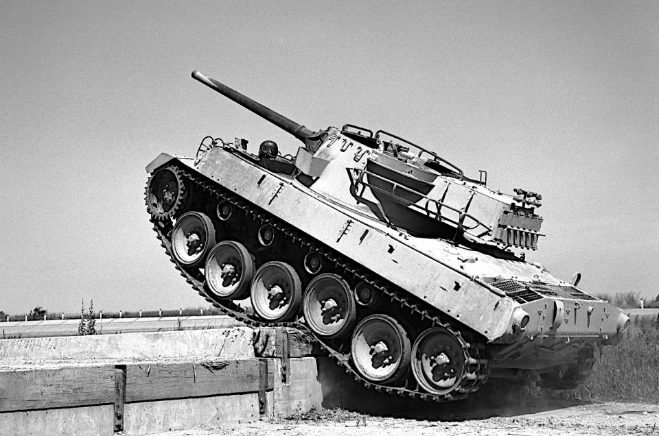 <p>GM brands on both sides of the Atlantic built tanks used in the Second World War and later conflicts. <strong>Buick</strong>, for example, designed and manufactured the <strong>M18 Hellcat</strong>, which was strictly speaking a <strong>tank destroyer</strong>, intended to demolish enemy tanks.</p><p>The <strong>Cadillac Gage</strong> division produced tanks for decades under GM ownership before being acquired by <strong>Textron</strong>. It is now known as <strong>Textron Marine & Land Systems</strong>. In the UK, <strong>Vauxhall</strong> suspended all car production at its Luton factory and devoted itself to building several thousand examples of the <strong>Churchill tank</strong>.</p>