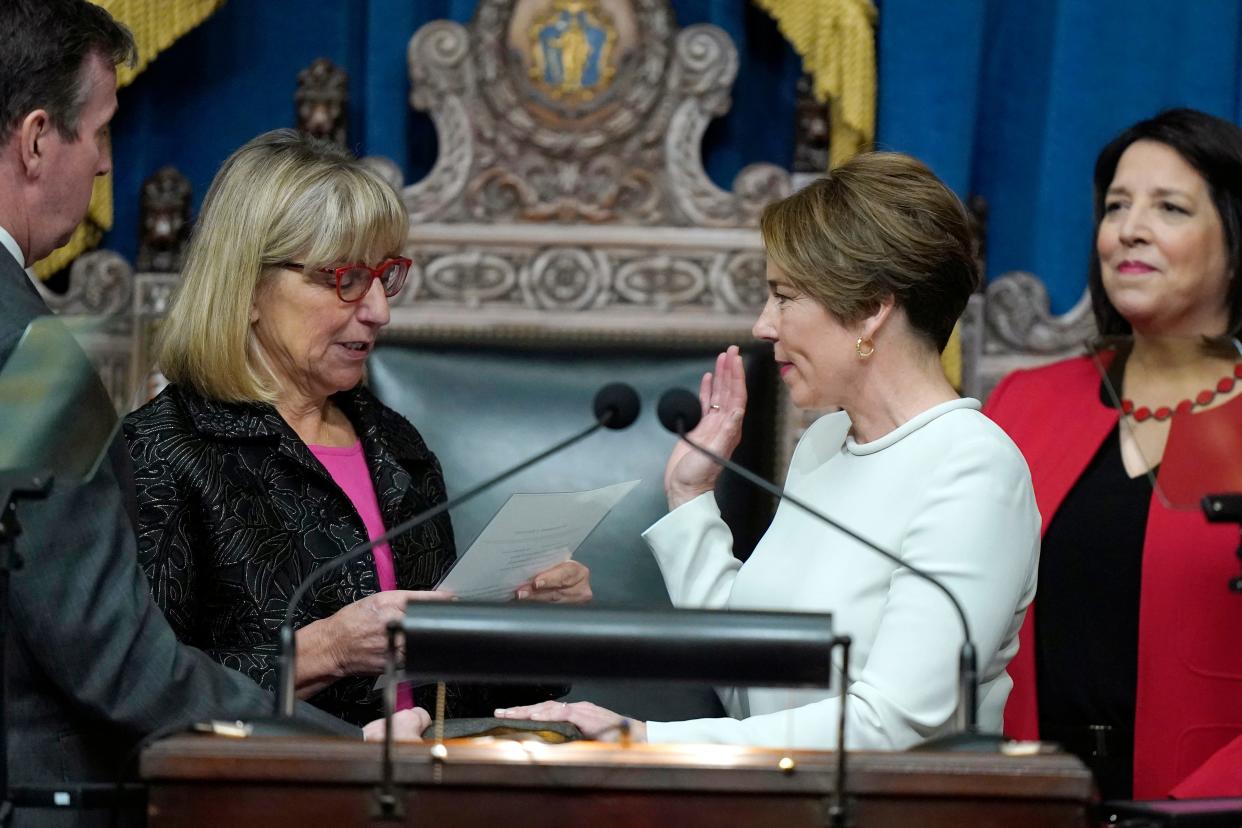 Maura Healey, center, is sworn in as Massachusetts governor by state Sen. President Karen Spilka, left, as Kim Driscoll looks on during inauguration ceremonies Thursday at the Statehouse, in Boston.