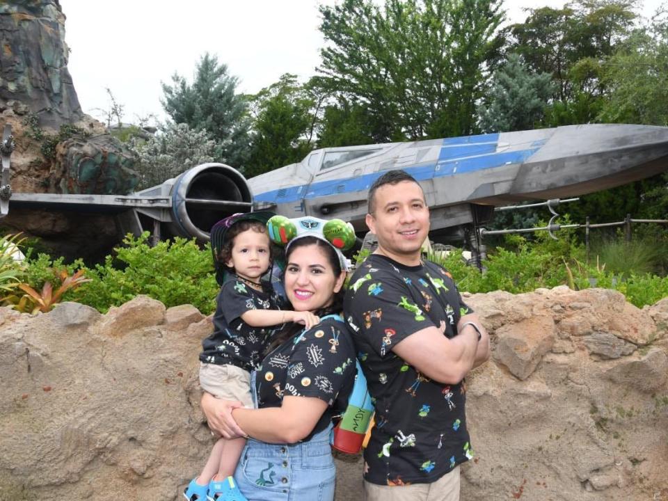 Disney fan Jacqueline Griego and her family at Galaxy's Edge in Disney World.