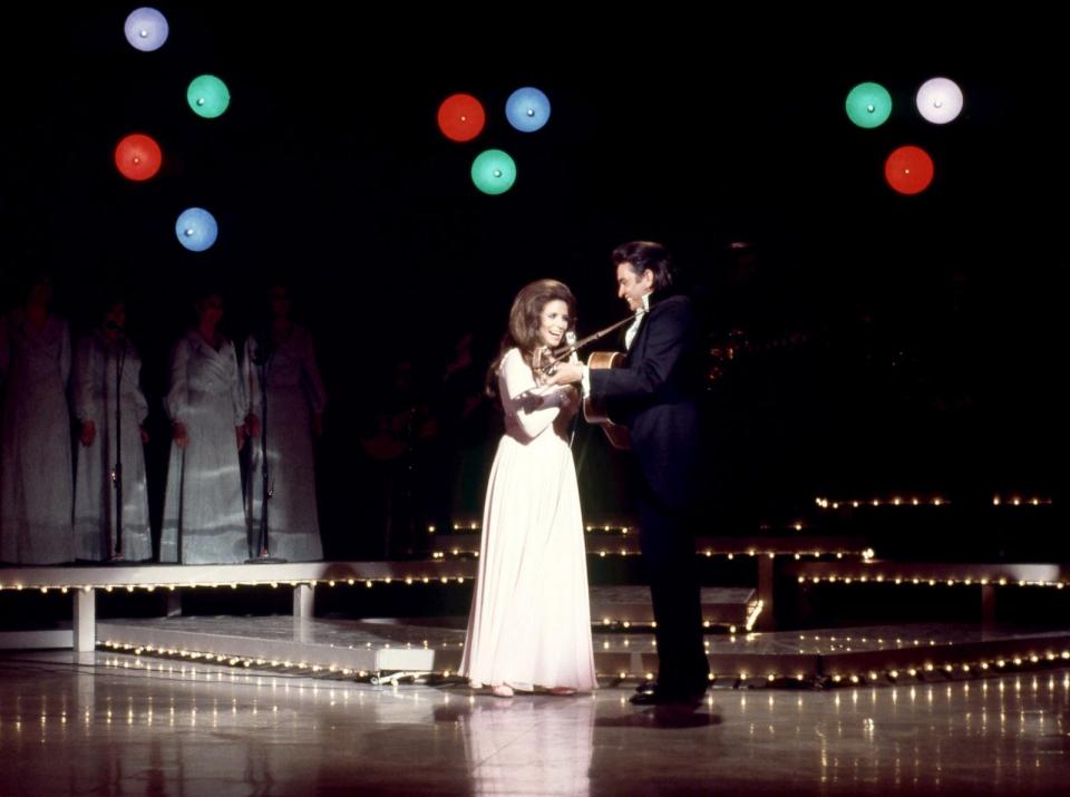 PHOTO: June Carter Cash and her husband Johnny Cash sing on stage during an episode of The Johnny Cash Show, in Tucson, Arizona, April 15, 1970.  (Getty Images, FILE)