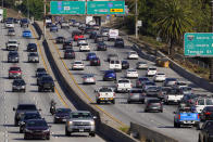 FILE - This April 16, 2020 file photo shows traffic on the Hollywood Freeway (U.S. 101) in Los Angeles. California Gov. Gavin Newsom said Wednesday, Sept. 23, 2020 that the state will halt sales of new gasoline-powered passenger cars and trucks by 2035. On Wednesday he ordered state regulators to come up with requirements to meet that goal. California would be the first state with such a rule, though Germany and France are among 15 other countries that have a similar requirement. (AP Photo/Mark J. Terrill, File)