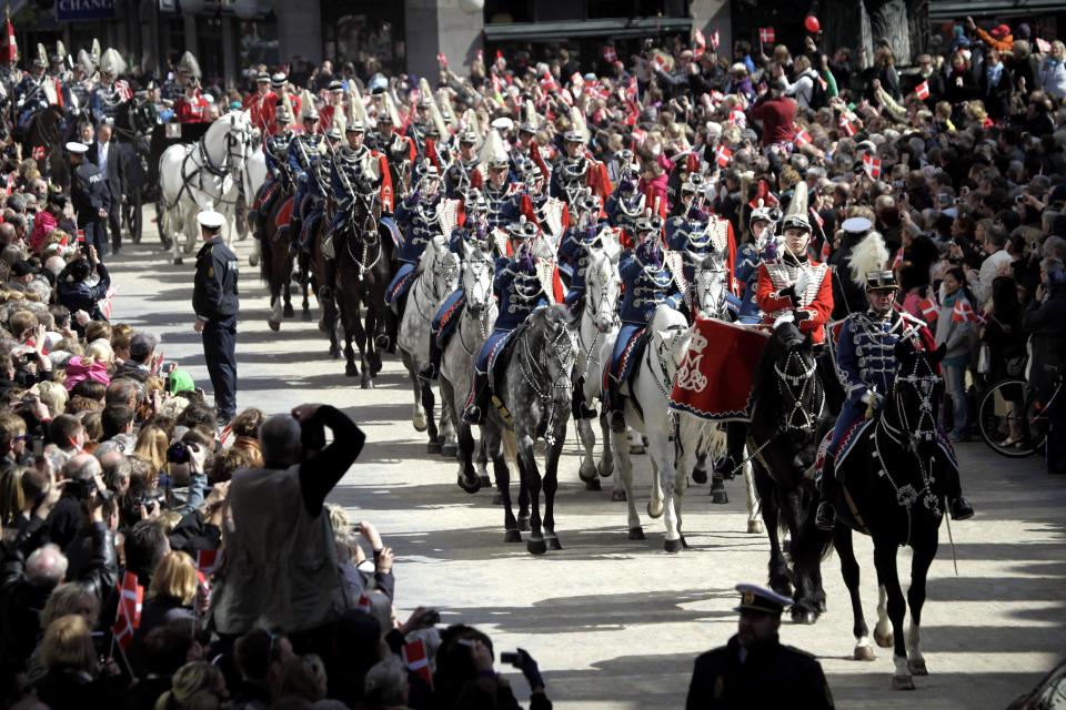 FILE - This is a April 16, 2010, file photo of the Queen's Cavalry Squadron, passing down the shopping street Stroeget in Copenhagen, Denmark, during celebrations of Queen Margrethe's 70th birthday. (AP Photo/Polfoto/Niels Hougaard,File) DENMARK OUT
