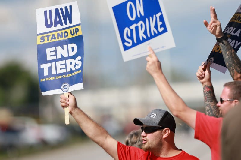 United Auto Workers strike outside an entrance to the Stellantis factory where the Jeep Wrangler and Gladiator are built in Toledo, Ohio, in September. File Photo by Aaron Josefczyk/UPI