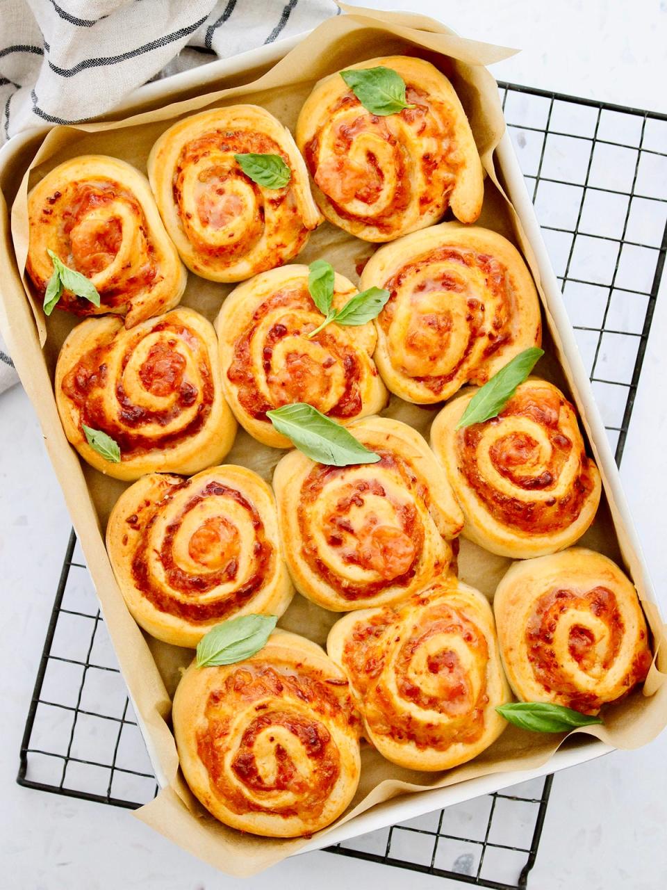 These easy peasy pizza scrolls are a sure fire crowd pleaser, whether as a snack or part or as a meal (FAB Flour)