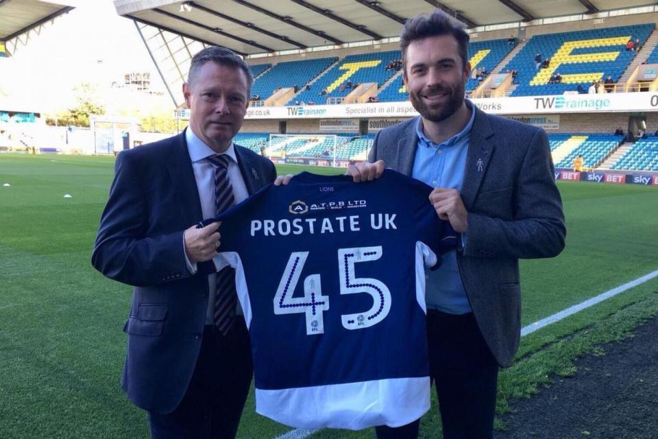 Millwall CEO Steve Kavanagh with Prostate Cancer UK's Jake Martens