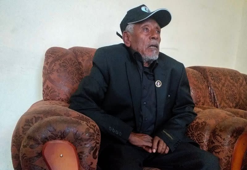 Hundeessaa Bonsa, father to the slain Ethiopian political singer Haacaaluu Hundeessaa talks during a Reuters interview at their home in Ambo