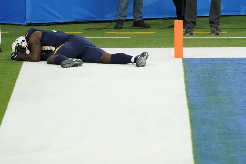 Los Angeles Chargers wide receiver Mike Williams lies on the field after an injury during the second half of an NFL football game against the Las Vegas Raiders, Sunday, Nov. 8, 2020, in Inglewood, Calif. (AP Photo/Ashley Landis)