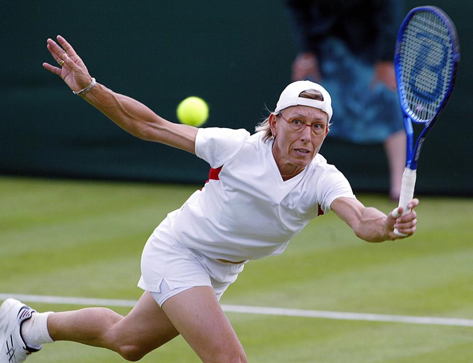 Martina Navratilova, at age 47, hitting a forehand during the 2004 Wimbledon Tennis Championships.
