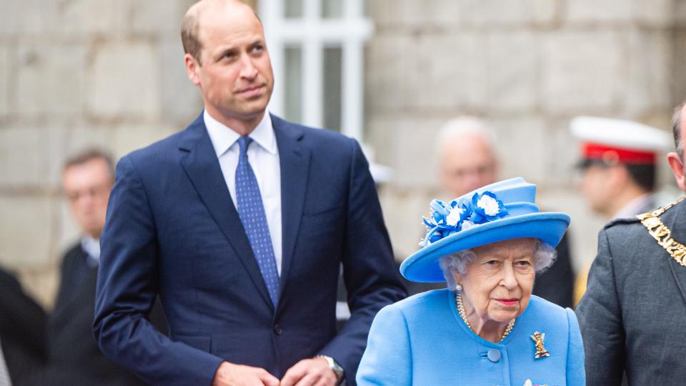 Royal family members walking behind the monarch