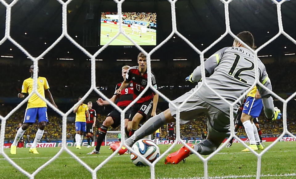 Germany's Andre Schuerrle (9) scores their sixth goal during their 2014 World Cup semi-finals against Brazil at the Mineirao stadium in Belo Horizonte July 8, 2014. REUTERS/Kai Pfaffenbach (BRAZIL - Tags: SOCCER SPORT WORLD CUP)