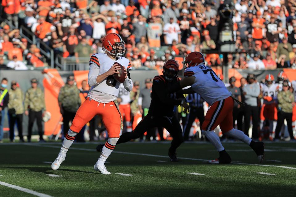 Cleveland Browns quarterback Baker Mayfield (6) throws during the second half of an NFL football game against the Cincinnati Bengals, Sunday, Nov. 7, 2021, in Cincinnati. (AP Photo/Aaron Doster)