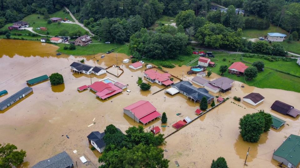 <div class="inline-image__caption"><p>Aerial view of homes submerged under flood waters from the North Fork of the Kentucky River in Jackson, Kentucky.</p></div> <div class="inline-image__credit">Leandro Lozada/AFP via Getty</div>