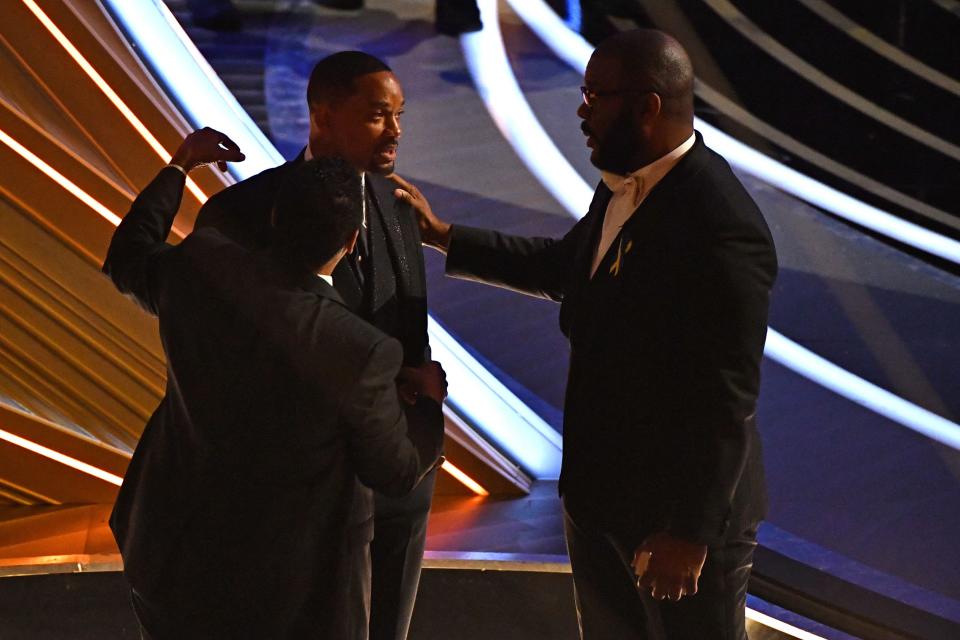 Denzel Washington and Tyler Perry talked with Will Smith following his altercation with Chris Rock at the Academy Awards.