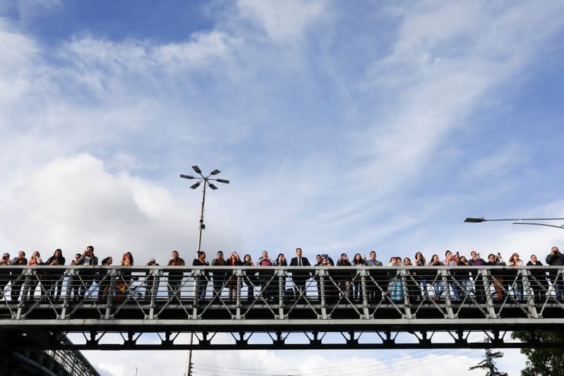 Demonstrators take part in a protest as a national strike continues in Bogota