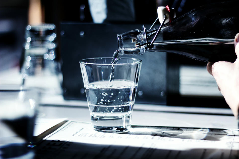 pouring water at restaurant