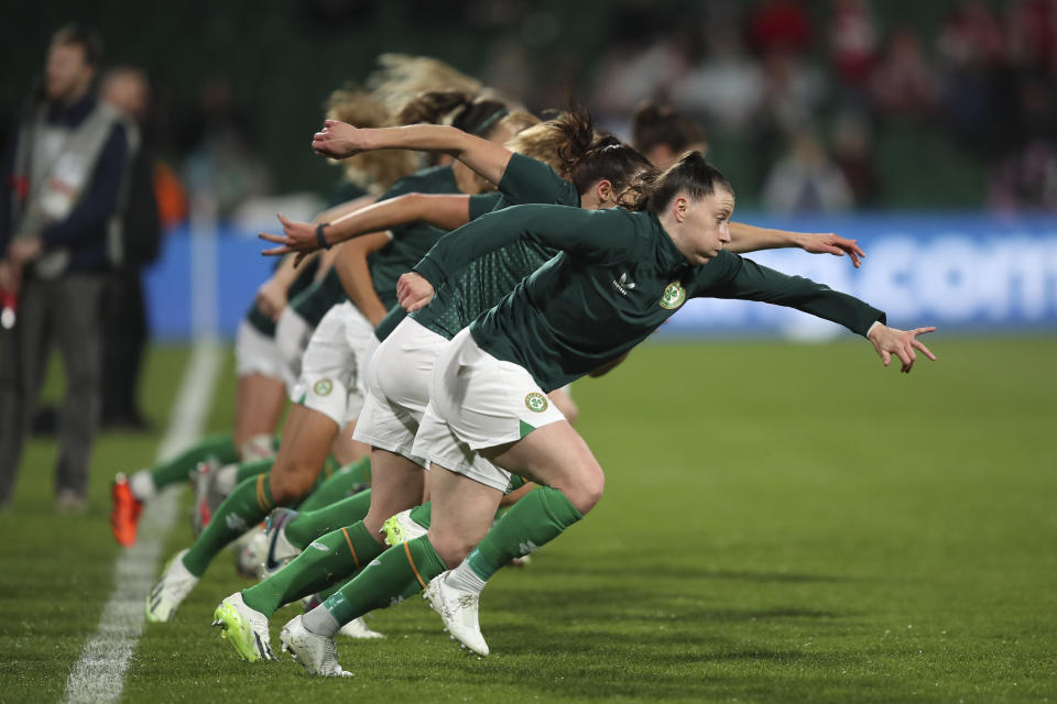 Irish soccer team players warm-up before the Women's World Cup Group B soccer match between Canada and Ireland in Perth, Australia, Wednesday, July 26, 2023. (AP Photo/Gary Day)