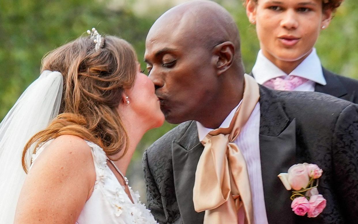 Princess Martha Louise of Norway and Durek Verrett kiss