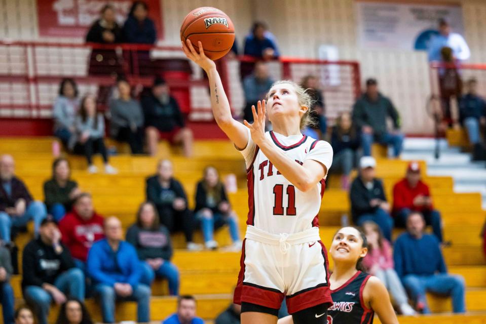 IUSB's Katie Gard (11) drives to the basket during the IUSB vs. IU Northwest women’s CCAC Tournament Championship game Monday, Feb. 27, 2023 in the Student Activities Center on campus at IUSB in South Bend, Ind. (Photo by Michael Caterina/Indiana University South Bend)