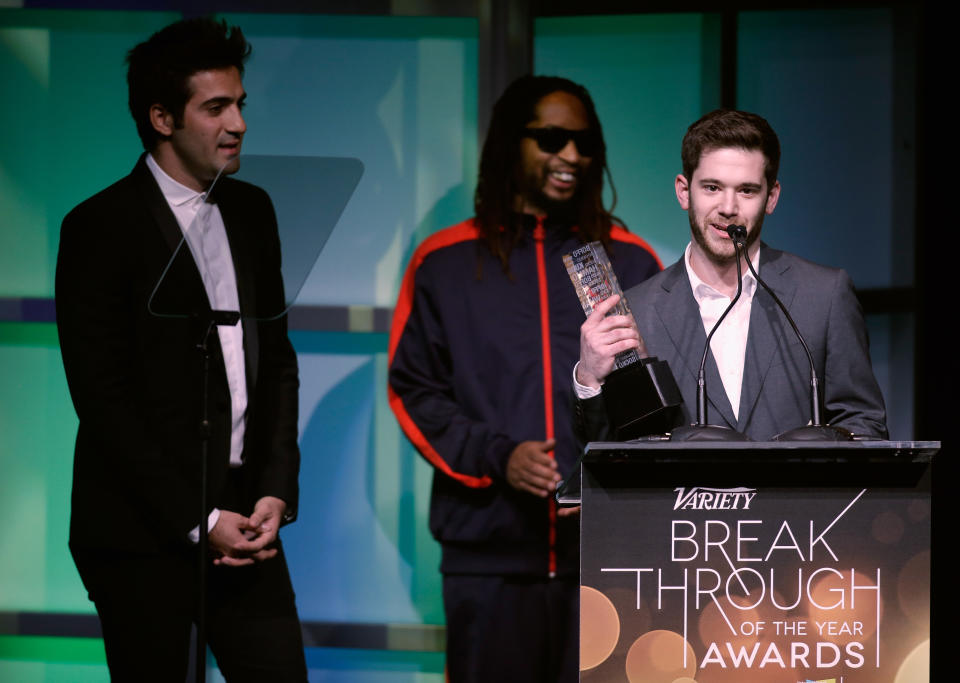 Colin Kroll, at podium, and Rus Yusupov, far left, accept the Breakthrough Award for Emerging Technology at the Variety Breakthrough of the Year Awards in 2014. (Photo: Isaac Brekken)