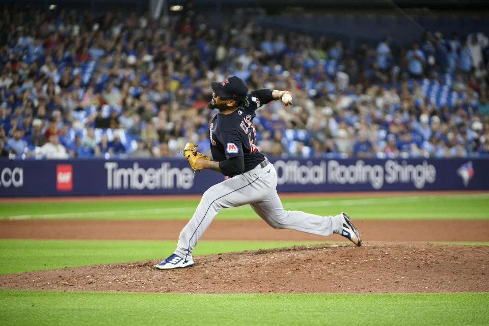 Cleveland Guardians relief pitcher Emmanuel Clase works against the Toronto Blue Jays during the ninth inning of a baseball game in Toronto, Friday, Aug. 25, 2023. (Christopher Katsarov/The Canadian Press via AP)