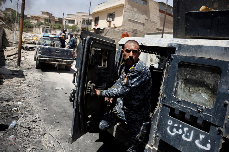 An Iraqi Federal Policeman during clashes with Islamic State fighters in Mosul