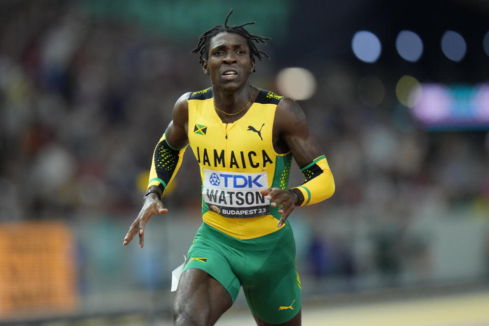 Antonio Watson, of Jamaica crosses the line to win the gold in the final of the Men's 400-meters during the World Athletics Championships in Budapest, Hungary, Thursday, Aug. 24, 2023. (AP Photo/Petr David Josek)