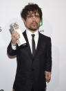 Peter Dinklage poses with the performer tribute award at the Gotham Awards at Cipriani Wall Street on Monday, Nov. 29, 2021, in New York. (Photo by Evan Agostini/Invision/AP)