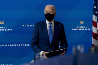 President-elect Joe Biden departs a news conference after introducing his nominees and appointees to economic policy posts at The Queen theater, Tuesday, Dec. 1, 2020, in Wilmington, Del. (AP Photo/Andrew Harnik)