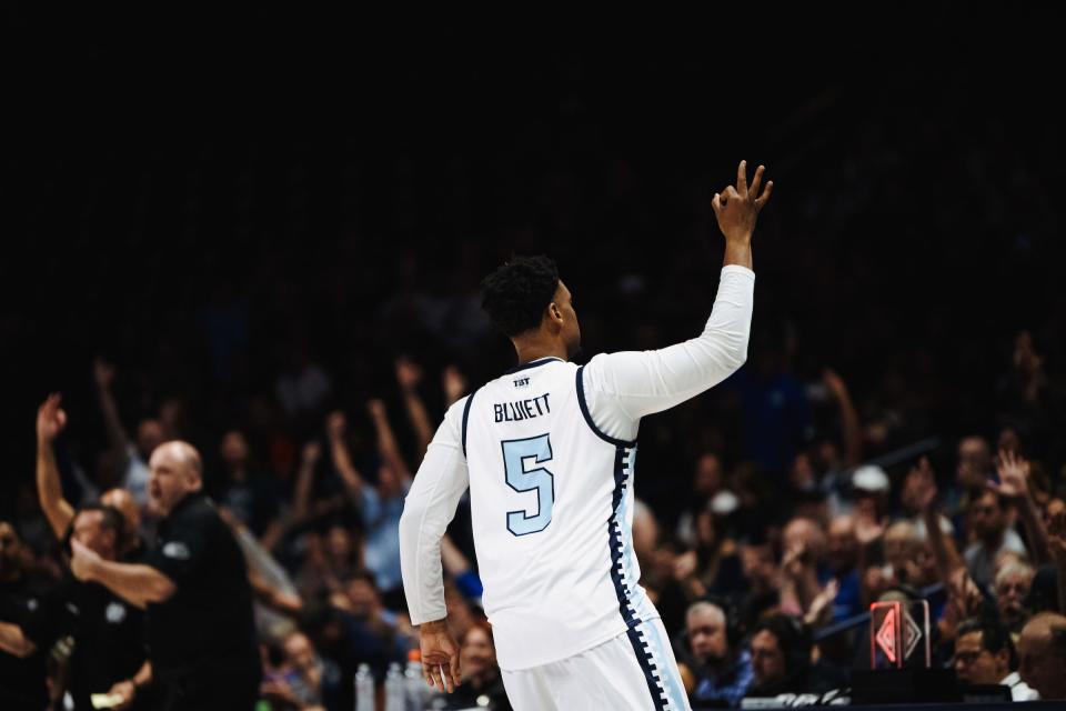 Trevon Bluiett of Zip 'Em Up signals a three at The Basketball Tournament Friday, July 21, at Cintas Center.