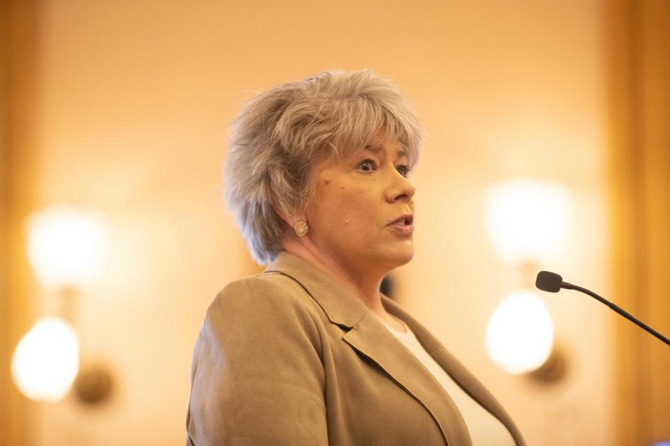 Christine Osterlund, state Medicaid director and a deputy secretary at the Kansas Department of Health and Environment, answers questions at Wednesday's Medicaid expansion hearing.