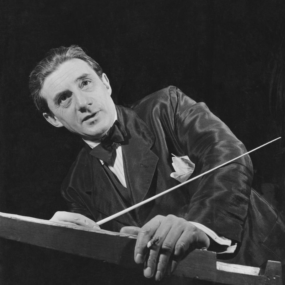 The conductor Sir John Barbirolli during a rehearsal with the Hallé Orchestra in 1952 - Getty Images