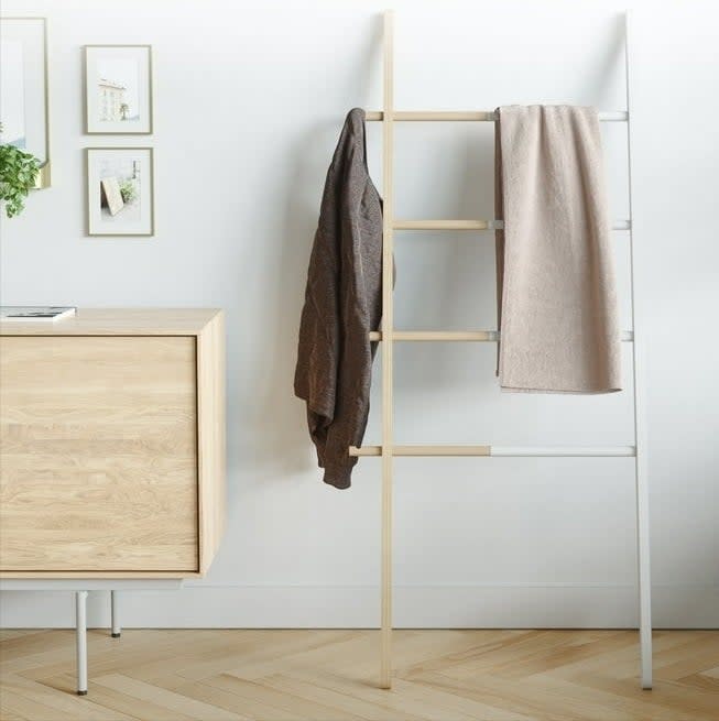 the two-tone blanket ladder holding blankets