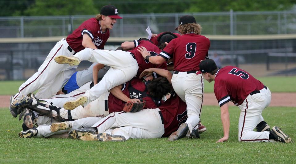 Elmira celebrates a 5-4 win over Corning in a Section 4 Class AA baseball semifinal May 20, 2022 at Corning-Painted Post High School.