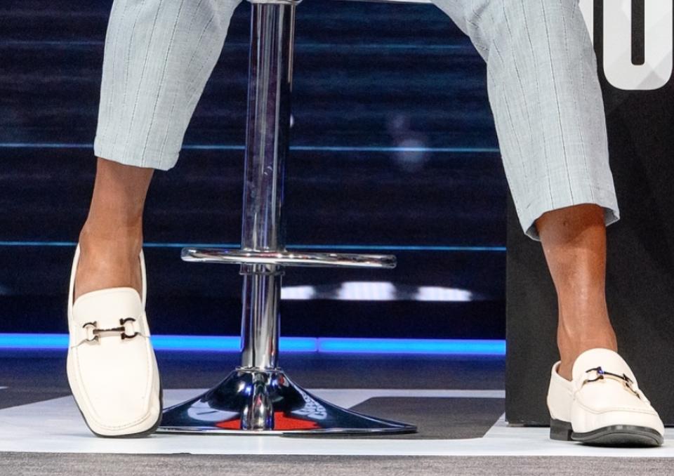 A closer look at Mike Tyson wearing white Gucci Horsebit Loafers